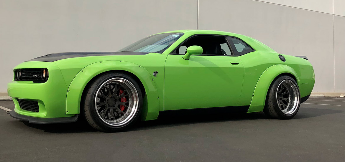 2018 Challenger SRT<sup>®</sup> Hellcat Widebody” width=”1170″ height=”600″></a></h3>
<p>Before Dodge came out with the 2018 Challenger SRT<sup>®</sup> Hellcat Widebody, the owner of this ’15 Hellcat decided to build his own. Using an aftermarket fender flare kit and custom wheel sizes, this Challenger is painted in Sublime Green and won’t sneak up on anyone. It bid up to $50,000, where it currently sits in Mecum’s “The Bid Goes On.”</p>
<p> </p>
<div class=