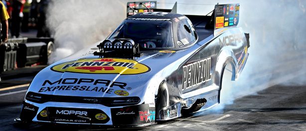 Matt Hagan's Pennzoil Mopar Express Lane Dodge Charger SRT Funny Car doing a burnout