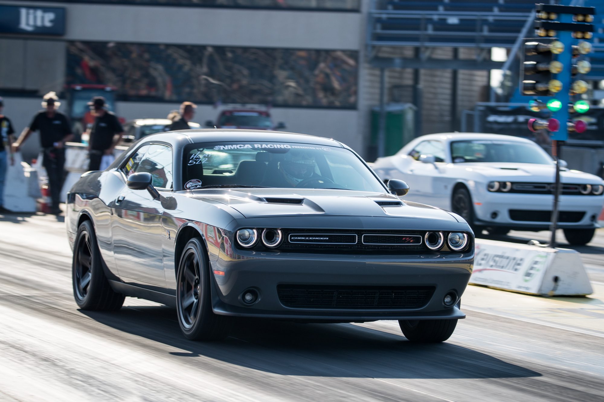two dodge vehicles staging to drag race