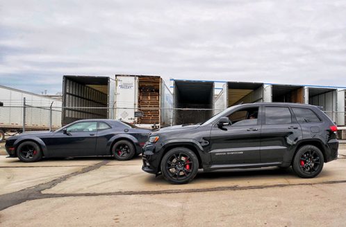 two black vehicles parked