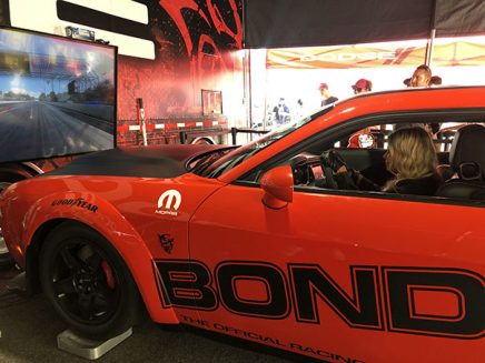 carmen electra in a dodge srt demon simulator