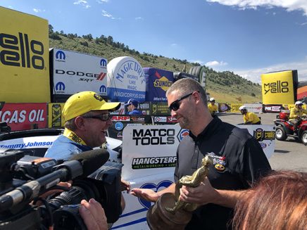 tommy johnson jr showing his trophy