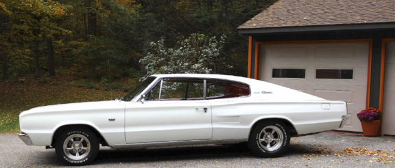 Driver side view of white 1966 Dodge Charger