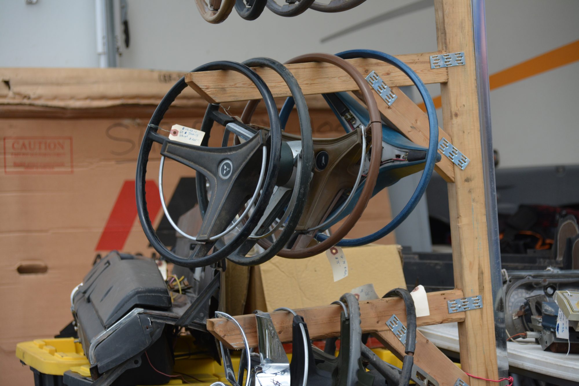 Steering wheels hanging on a rack