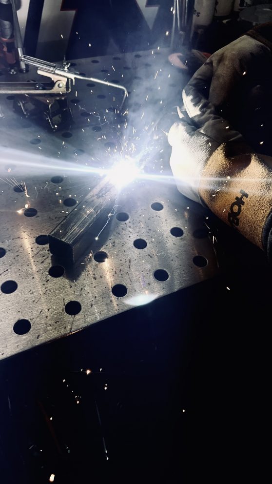 man welding
