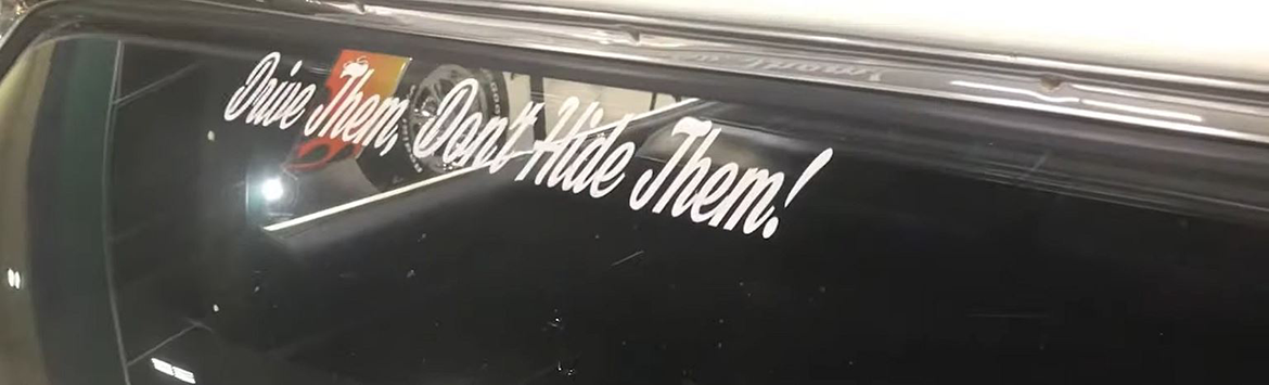 Graphic phrase on the rear windshield