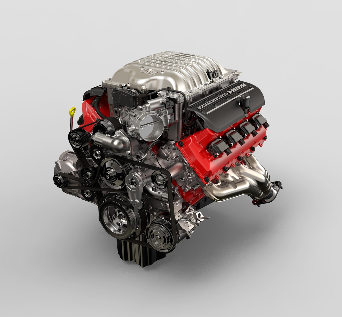 A detailed, high-resolution image of a supercharged V8 engine with red valve covers, visible pulleys, serpentine belt, and exhaust manifolds, displayed against a plain light gray background.